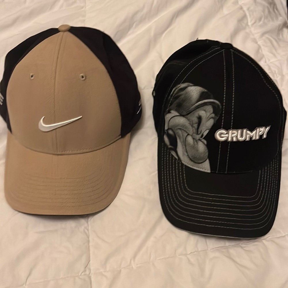 Nike cap and a grumpy Walt Disney for the man they are. Lol